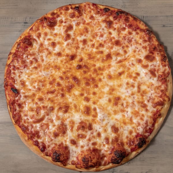 Whole cheese pizza with a golden crust and bubbly melted cheese on a wooden table.